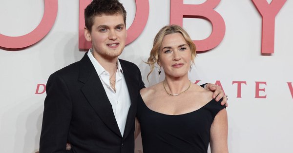 Кейт Уинслет позирует с красивым молодым человеком на красной дорожке